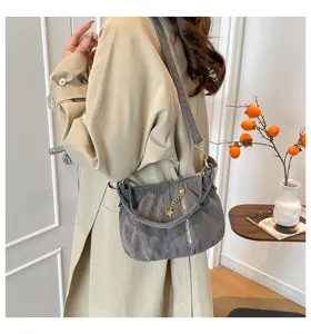Stylish grey ruched shoulder bag for women, autumn winter fashion commuting crossbody handbag.