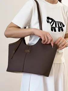 Womens brown tote bag stylish large capacity shoulder bag for daily commuter work.