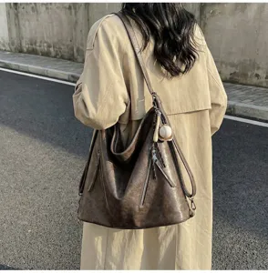 Vintage leather hobo tote bag for women, large capacity casual shoulder bag for daily commute.