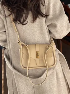 Chic beige leather crossbody bag for women, vintage messenger shoulder bag with metal lock.