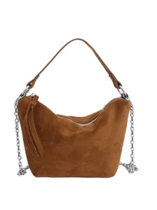 Vintage brown suede shoulder bag with silver chains, stylish dumpling crossbody design for women.