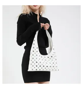 Detailed view of the trendy studded shoulder underarm bag showcasing metallic rivet details.