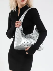 Silver metallic shoulder underarm bag for women with stylish round rivet decorations.
