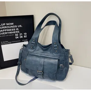 Vintage blue large capacity shoulder tote bag featuring front pocket and adjustable strap.