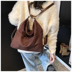 Zaino retro in camoscio da donna, borsa a spalla marrone grande capacità per autunno inverno.