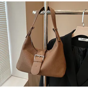 Brown vintage textured underarm shoulder bag with buckle strap, large capacity commuter bag.