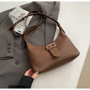 Vintage brown pleated shoulder bag with chic front buckle, elegant hobo underarm design for women