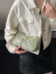 Green motorcycle shoulder bag for women, stylish PU leather underarm bag with buckles.