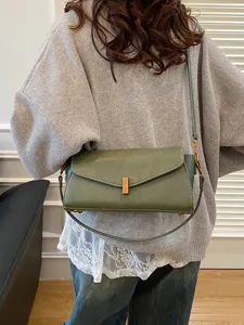 Stylish green leather shoulder bag for women with metal clasp casual crossbody design main