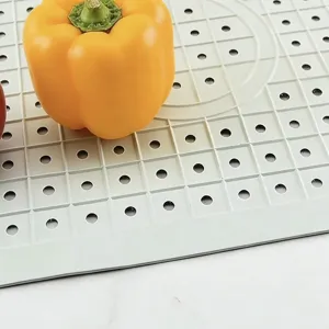 Kitchen sink drain mat silicone grid hollow countertop heat insulation pad for drying.