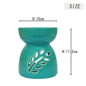 Türkisblaues Keramik-Duftlampen-Design mit Blattausschnitt, 10 cm Durchmesser, 11,2 cm Höhe.