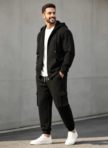 Closeup detail of men black fleece zip hoodie and cargo sweatpants tracksuit set, casual style.