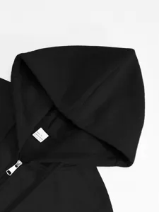 Black zip-up hoodie for men, featuring cozy hood, durable metal zipper, and comfortable fit.