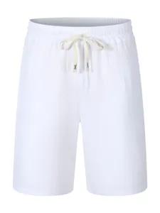 Men's casual shorts detail view, white cotton linen drawstring beach shorts for summer vacation.