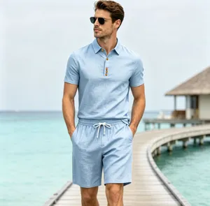 Outdoor detail shot of men's summer linen short sleeve polo shirt and matching shorts outfit.