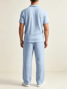 Men's casual linen short sleeve polo shirt and matching long pants set for summer comfort wear.