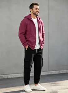 Detailed view of the casual men's fleece-lined hooded sweatshirt and cargo pants set in action.