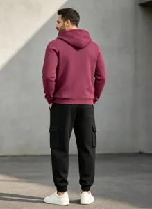 Men's casual fleece-lined hoodie and cargo sweatpants set, stylish autumn winter outfit.
