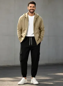 Detailed view of casual men's zip hoodie and cargo sweatpants outfit in stylish neutral tones.