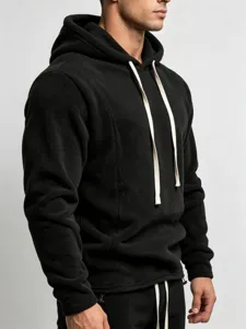 Detailed close-up shot of men's black fleece thermal hoodie featuring contrast white drawstrings.