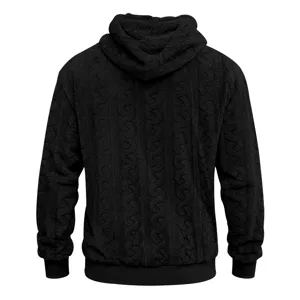 Back detail view of black fuzzy fleece cable knit hoodie showing texture and hood.