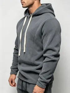 Detailed view of men's grey fleece hoodie, soft warm fabric texture, comfortable fit.