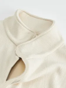 Men's thermal fleece lined stand-up collar jacket detail view, premium ribbed knit fabric.
