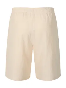 Detail view of casual men's light beige elastic waist shorts, comfortable fabric fit.