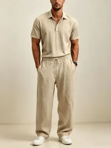 Detail shot of breathable khaki short sleeve polo shirt and loose casual pants set for men.