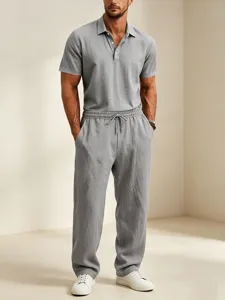 Men casual cotton linen short sleeve polo shirt and loose long pants set for spring summer.