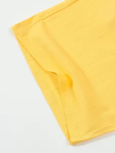Detailed close-up view of the yellow casual linen fabric texture and stitching craftsmanship.