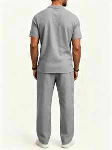 Detail view of men's casual short sleeve grey top and matching linen trousers for summer style.