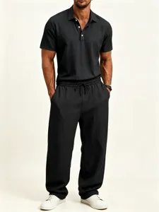 Men's casual breathable cotton linen polo shirt and loose trousers outfit detail view.