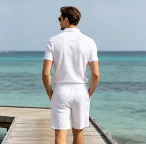 Detailed outdoor view of men white linen short sleeve polo shirt and shorts set.