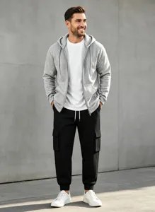 Detailed view of casual men's hoodie and cargo sweatpants set with white t-shirt outfit.