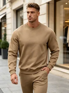 Men's solid color casual crewneck sweatshirt detail showcasing relaxed fit and soft fabric.