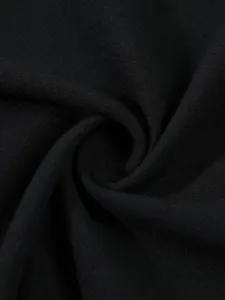 Black cotton linen shirt fabric detail close-up showing fine texture and breathable material.