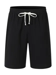 Casual black shorts for men featuring a white drawstring waist, comfortable and stylish.