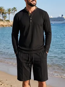Detailed view of men's waffle knit long sleeve polo shirt and matching casual shorts.
