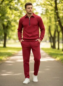 Detail view of men's knitted zipper polo sweatshirt and matching casual pants set.