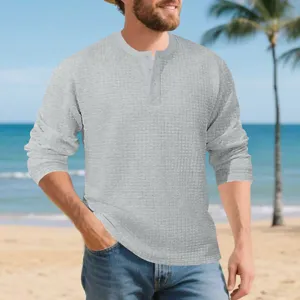 Men grey waffle knit long sleeve Henley shirt detail, vintage waffle texture casual base top.