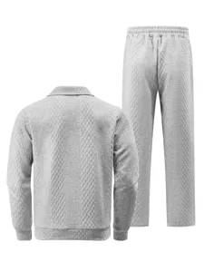 Detailed back view of men's grey jacquard knit tracksuit featuring polo collar and trousers.