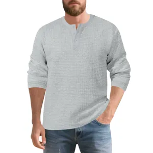 Men's grey waffle knit long sleeve Henley shirt detail view showcasing fabric texture.