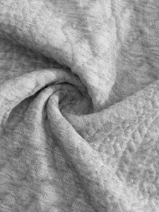 Grey jacquard fabric textile texture swatch for mens casual clothing design close up view