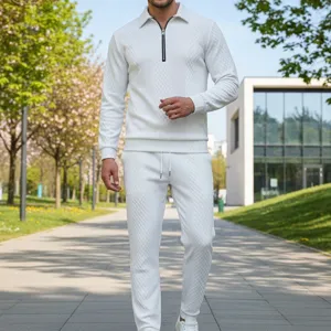 Men white jacquard tracksuit set featuring polo collar sweatshirt and casual trousers