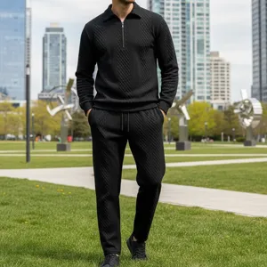 Men black jacquard long sleeve polo shirt and straight trousers casual tracksuit set for daily wear.