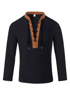 Detail view of the black waffle knit long sleeve shirt with brown lace up collar.
