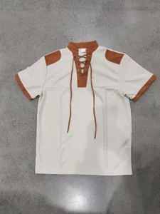 Detailed view of men medieval lace-up short sleeve Viking T-shirt in beige and brown.