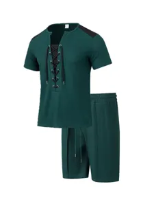 Detailed view of the dark green waffle-knit lace-up short-sleeve top and shorts set.
