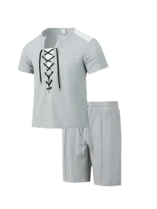 Detailed view of the grey waffle knit lace-up short sleeve t-shirt and matching shorts set.